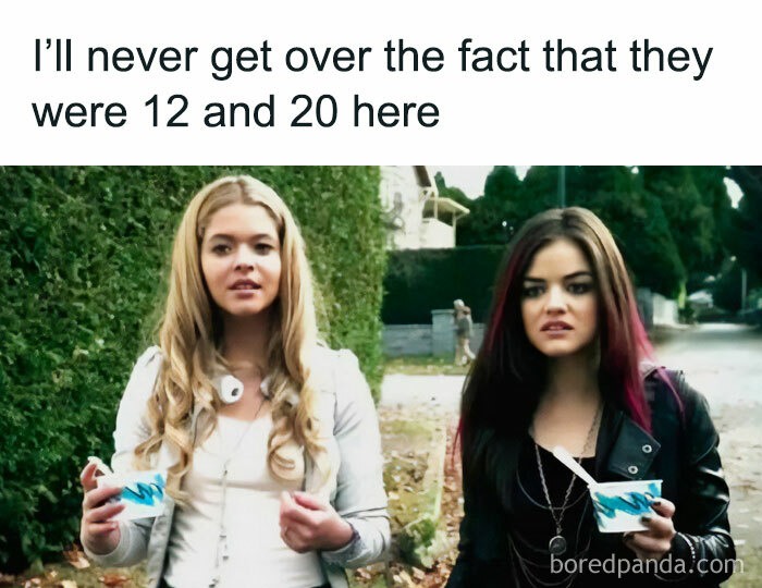 Two young women holding yogurt cups with a humorous text about their ages, a relatable-meme moment.