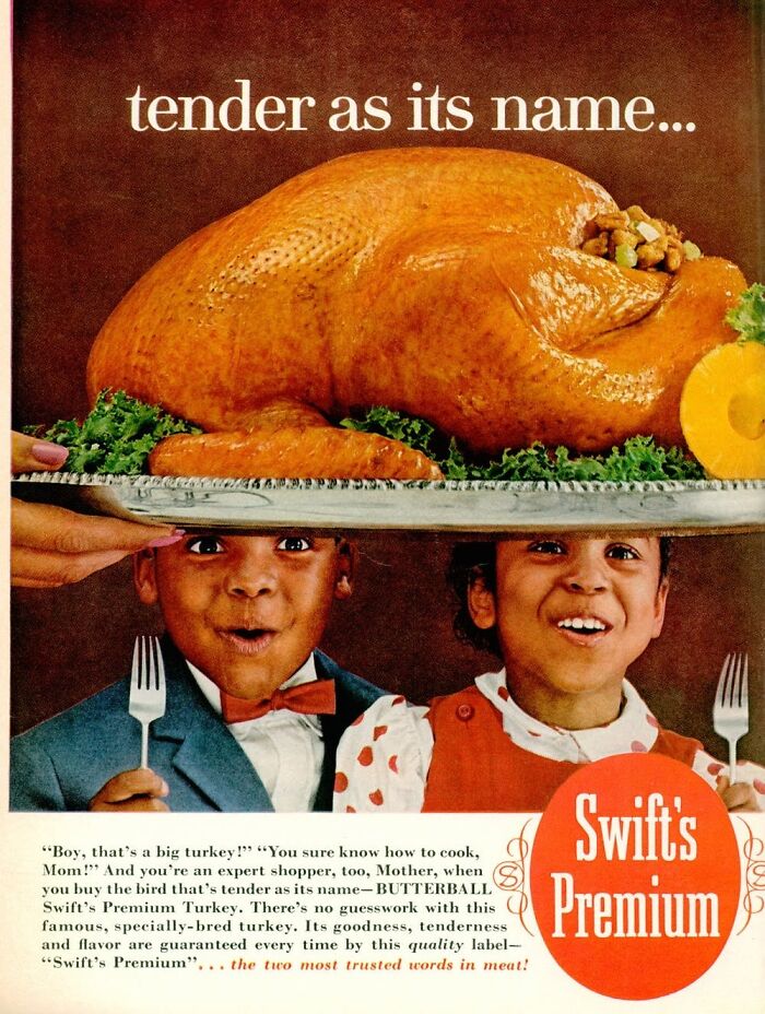 Vintage Thanksgiving ad featuring two children excitedly looking at a large, golden roast turkey on a platter.