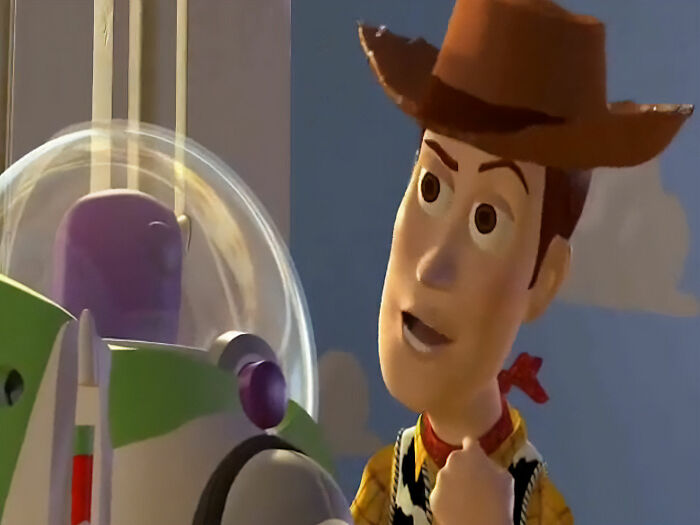 Animated characters Woody and Buzz in a movie scene, referencing movie jokes that took years to understand.