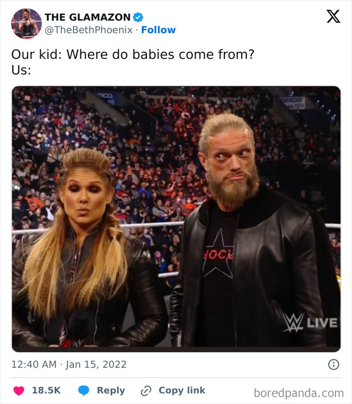 Two people making funny faces in response to a question about where babies come from, in a crowded WWE event.