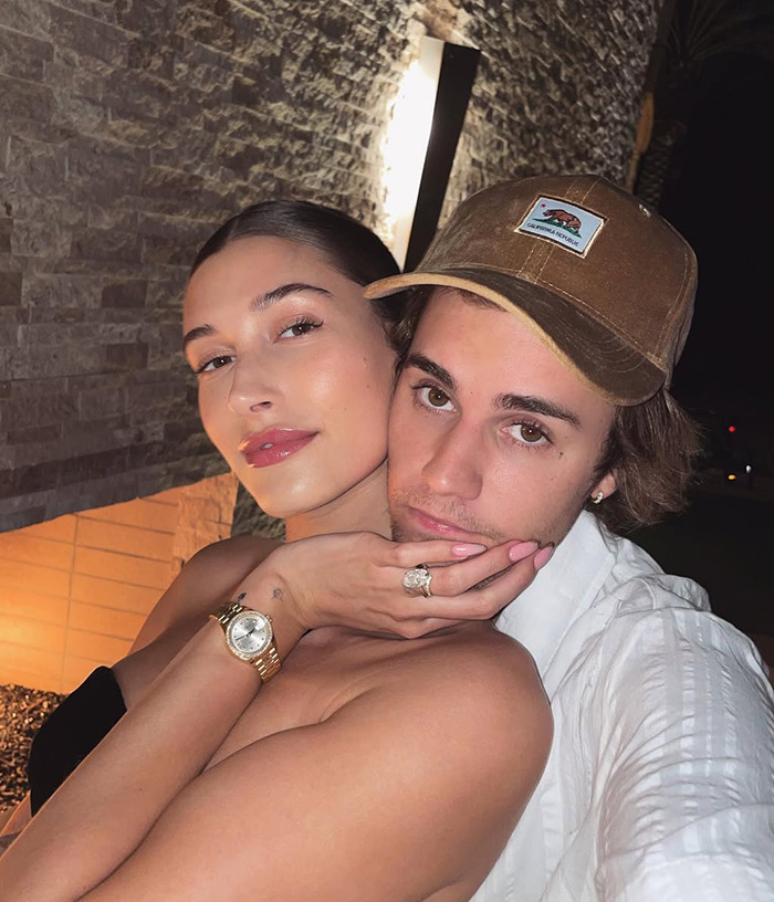 Justin Bieber and wife Hailey Bieber posing together. Justin Bieber and wife Hailey Bieber posing together.