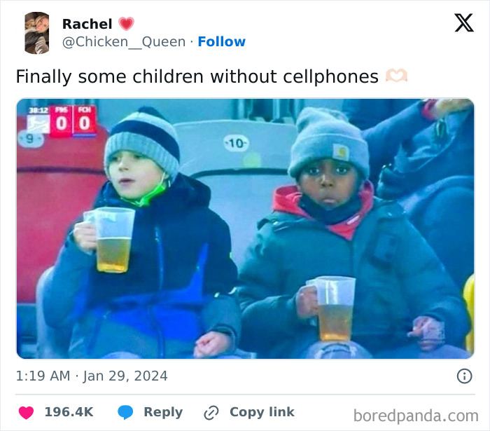 Two kids at a stadium, each holding a beer cup, creating a funny and bizarre scene.