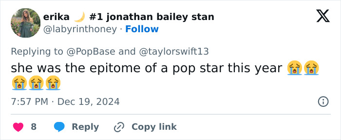 Tweet expressing fan outrage about Taylor Swift's pop star ranking with crying emojis.