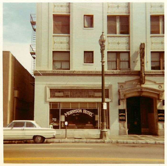 Vintage 1970s West Coast facade of Morrison Hotel with classic car parked in front.