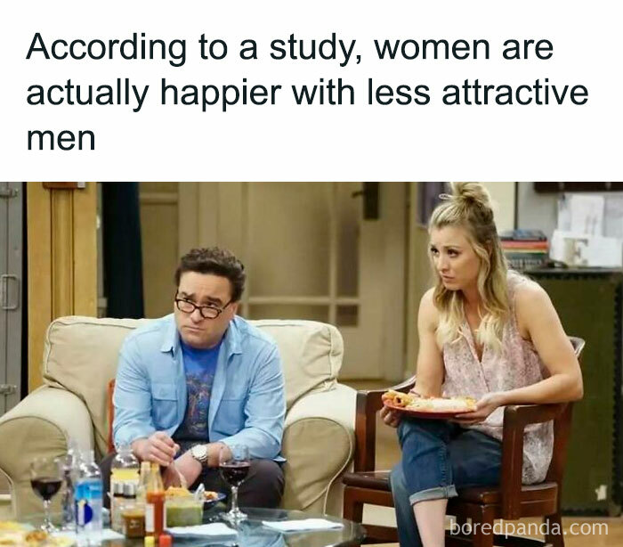 Two people sitting in a living room, discussing a study about happiness and attractiveness, representing undiscovered facts.