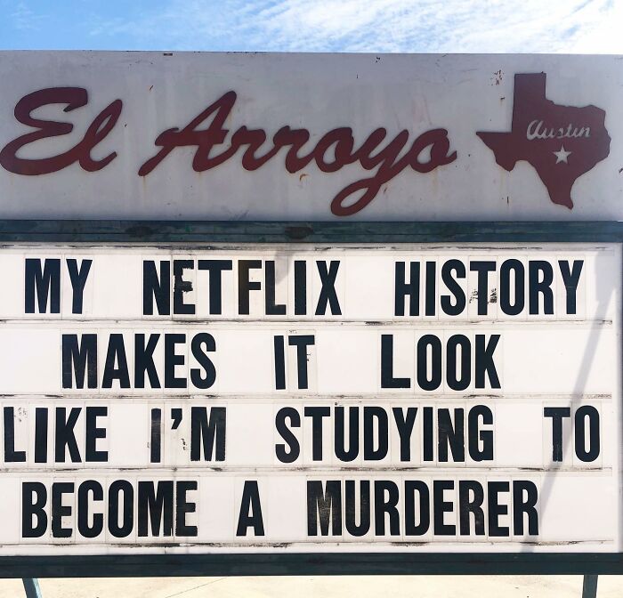 El Arroyo sign humorous message about Netflix history and m****r studies.