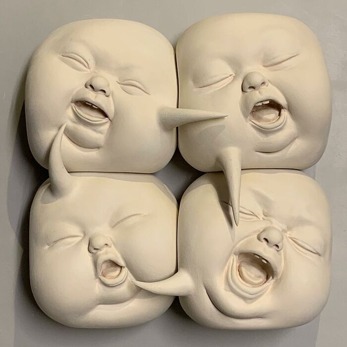 Surrealist sculptural art depicting four expressive baby faces with surreal features, blending realism and surrealism.