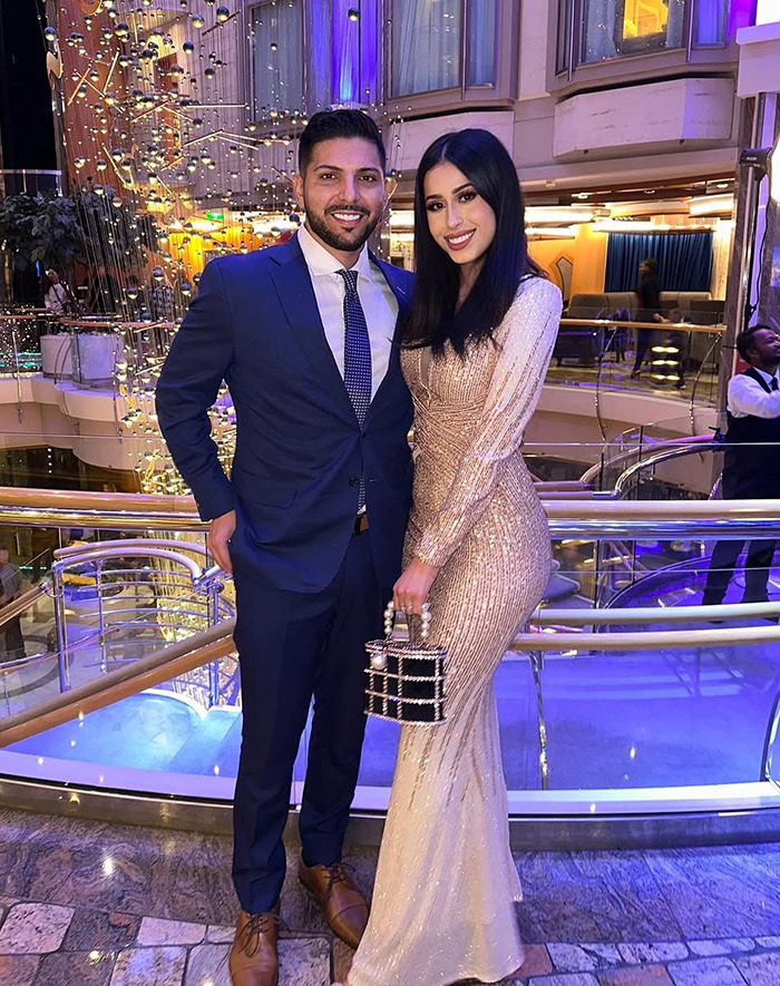 Dubai housewife Linda Andrade and her husband in elegant attire at a luxurious event, reflecting materialistic lifestyle.