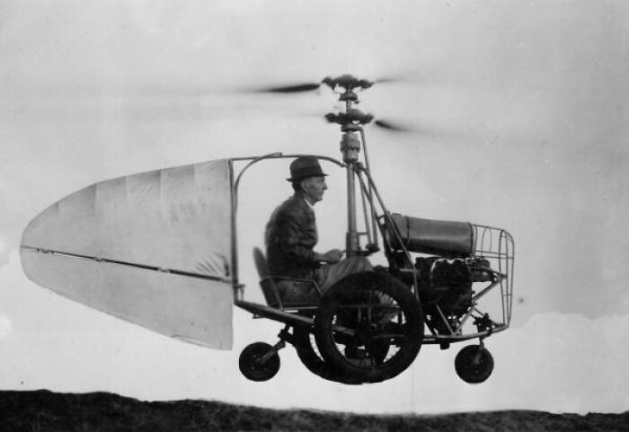 Man flying an early helicopter prototype, showcasing strange inventions in aviation history.
