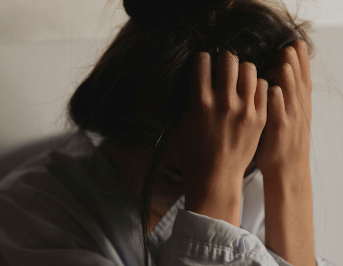 Woman with hands on head, upset over missing $7,000 wedding dress, linked to joke about pregnant mistresses. Woman with hands on head, upset over missing $7,000 wedding dress, linked to joke about pregnant mistresses.