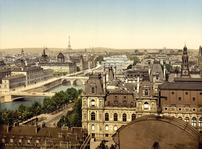 Oldest color photo of Paris skyline 100 years ago, featuring historic buildings and the Eiffel Tower.
