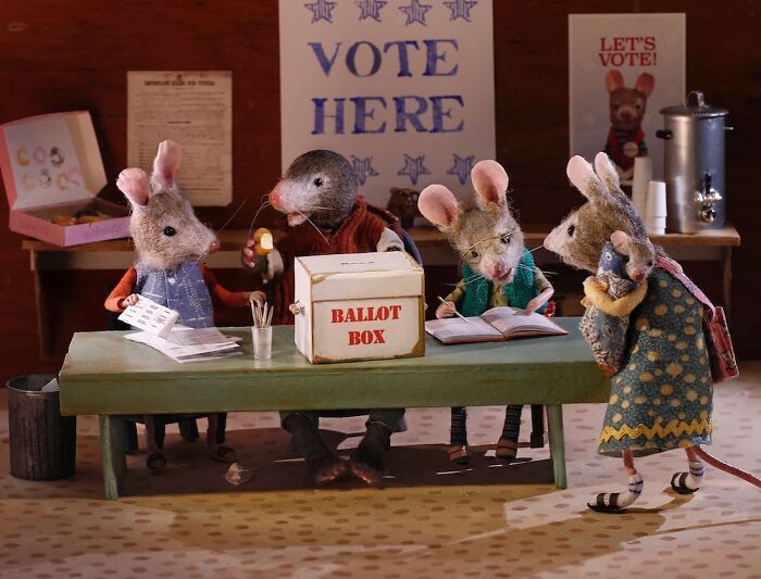 Miniature Mouseland election scene with mice voting at a ballot box, detailed setup by Maggie Rudy.