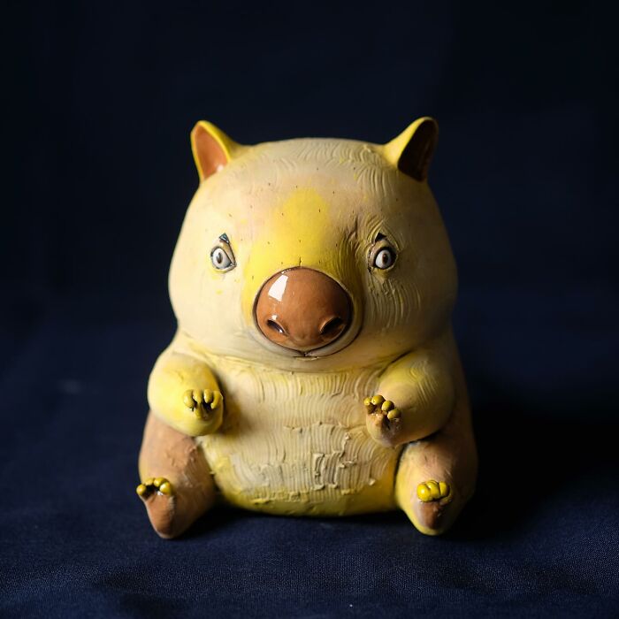 Playful ceramic sculpture of a whimsical animal by Nastia Calaca.