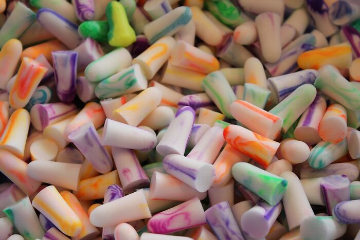 Colorful earplugs, emphasizing the importance of exercise for health according to doctors' advice.