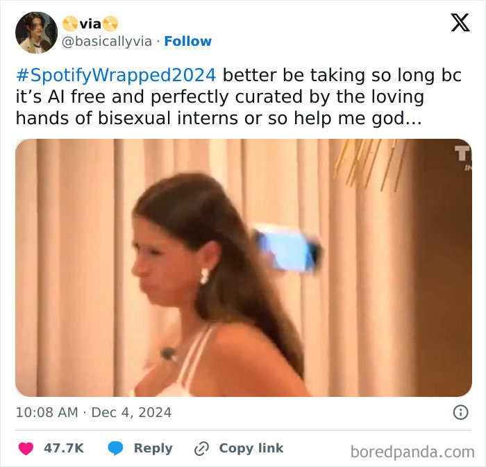 Tweet highlighting reactions to Spotify Wrapped 2024 with a person in a white outfit looking to the side.