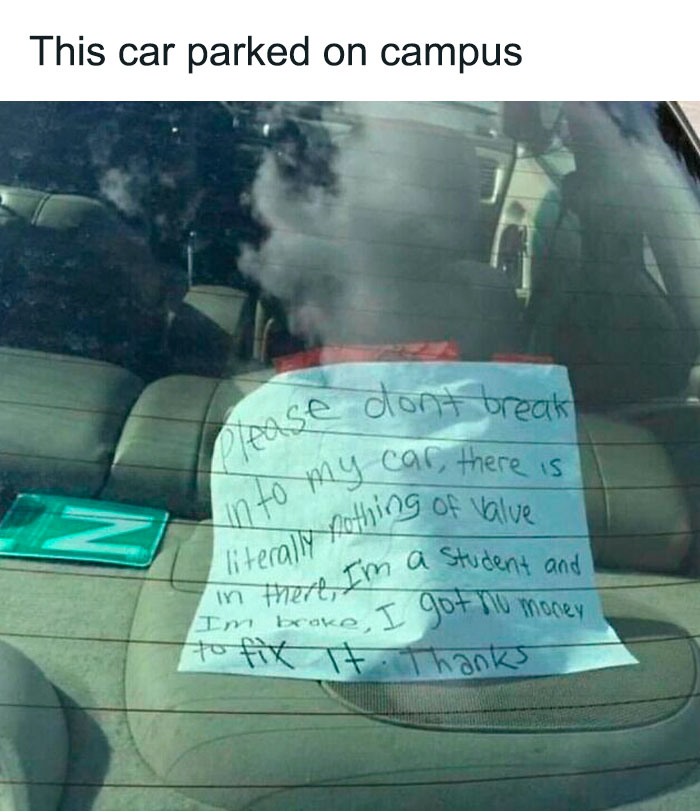 Car parked on campus with a humorous note about having nothing valuable.