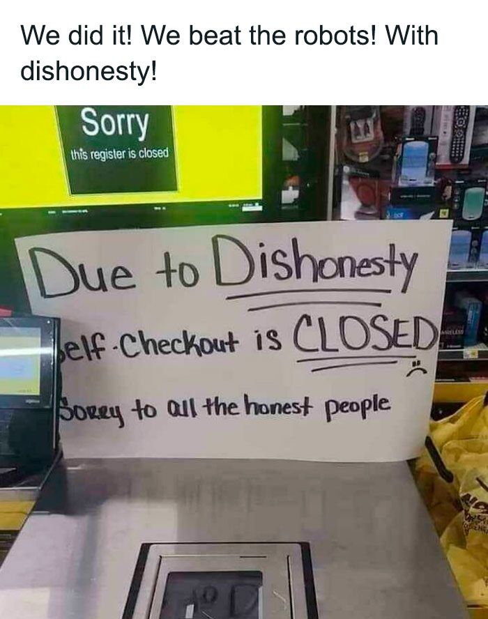 Sign saying self-checkout is closed due to dishonesty, humorous take on chaotic good action in store.