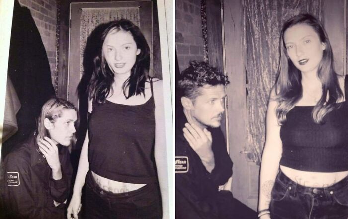 Two people recreating a wholesome family photo, featuring a woman in a black top and a man kneeling beside her.