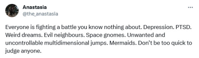 Tweet about empathy and understanding people's struggles, mentioning depression, PTSD, and cosmic challenges.