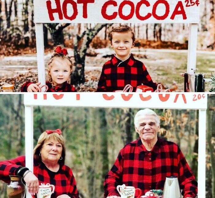 Family recreates photo at hot cocoa stand, wearing red plaid shirts in a wholesome scene.