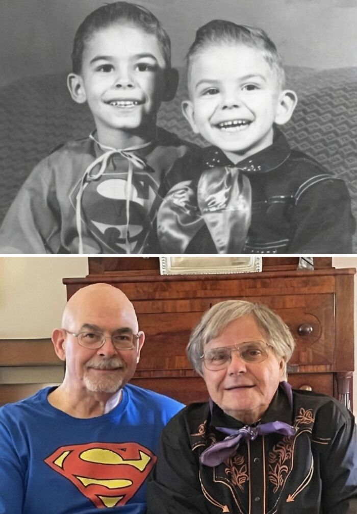 Two brothers recreate a wholesome family photo, smiling in superhero and cowboy outfits.