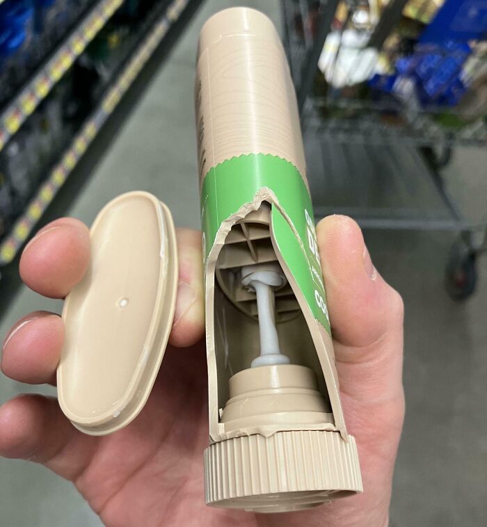 Misleading packaging showing a large container with a small amount of product inside, revealing empty space when opened.