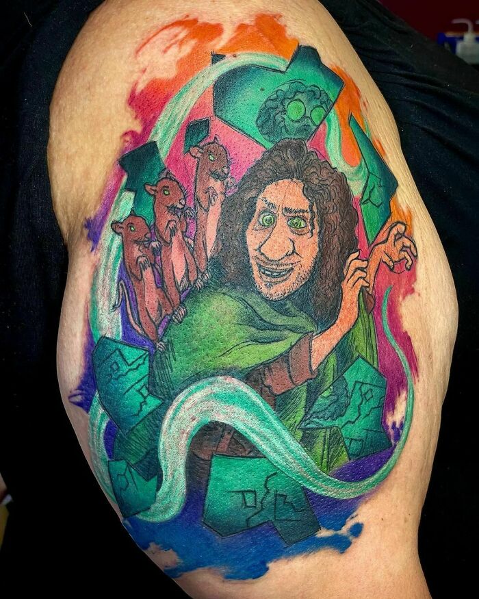 Colorful tattoo fail of a cartoonish man with animals on shoulder, showcasing vibrant colors and humorous design elements.