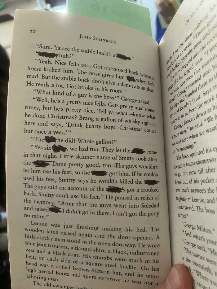 Person reading a page from John Steinbeck's book, depicting a school experience with controversial language.