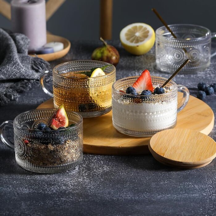 Unique glass cups with fruits and yogurt, showcasing weird kitchen items.