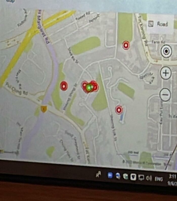 Map with GPS markers on a touchscreen, highlighting horrifying school experiences in a US setting, displayed on a monitor.