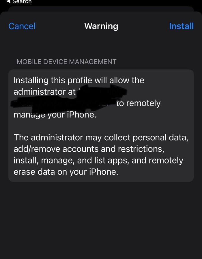 Warning screen on iPhone detailing remote management, linked to horrifying school experiences.