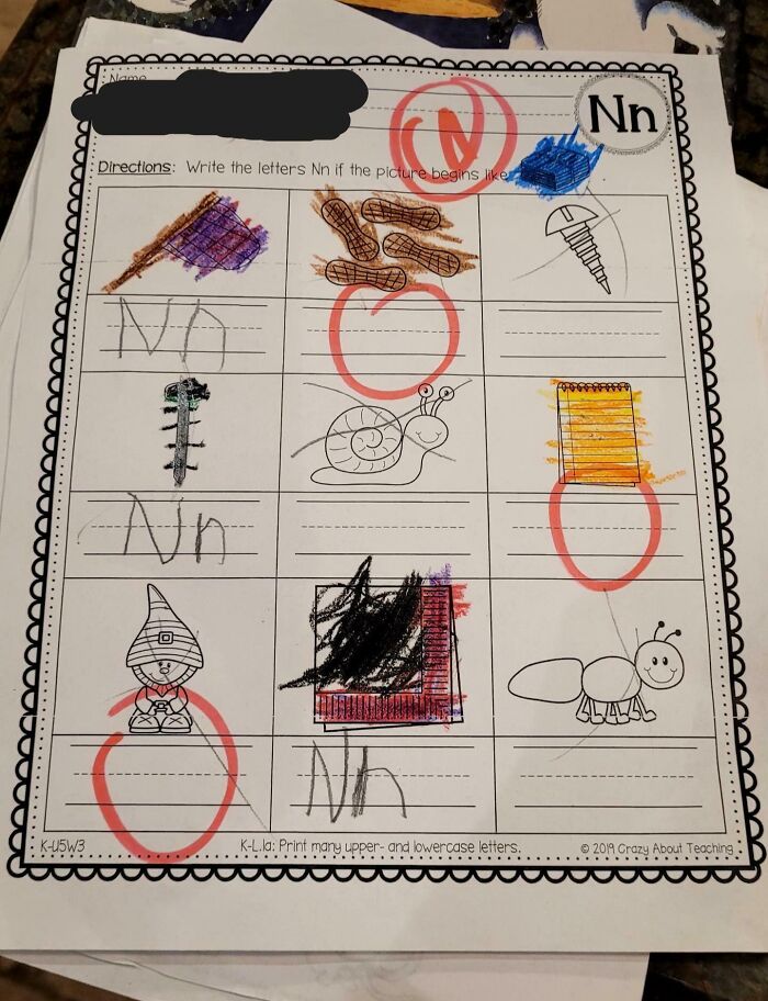 Children's worksheet with letter recognition, highlighting school experiences.