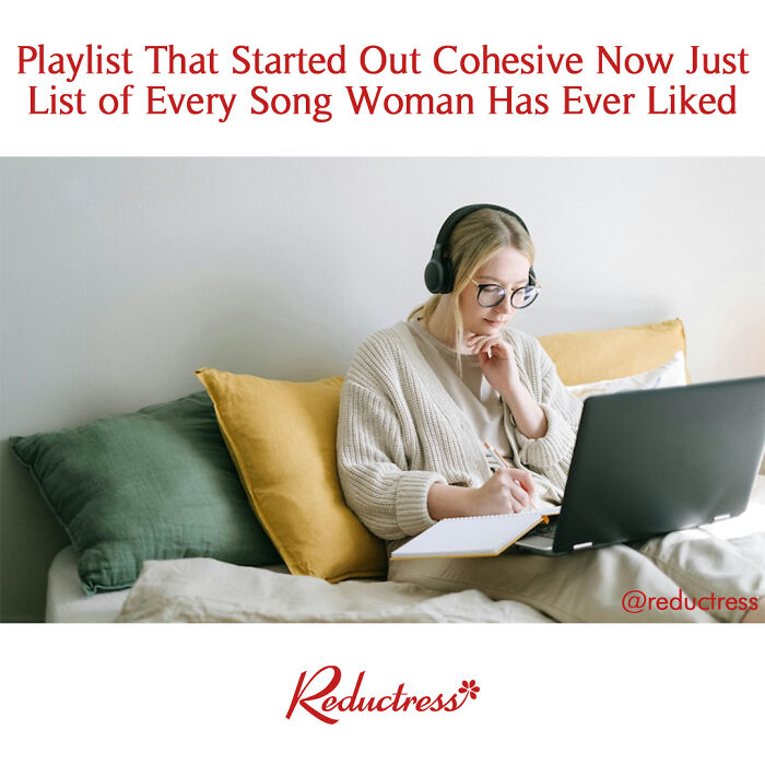 Woman with headphones writing while using laptop, humorous fake headline about playlist.