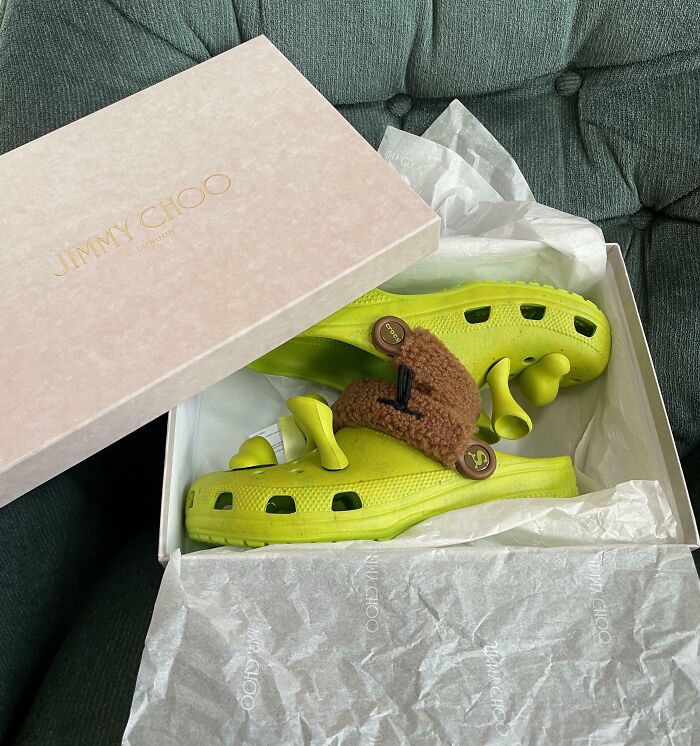Open box with quirky green sandals, perfect for hilarious trolling Christmas gifts.
