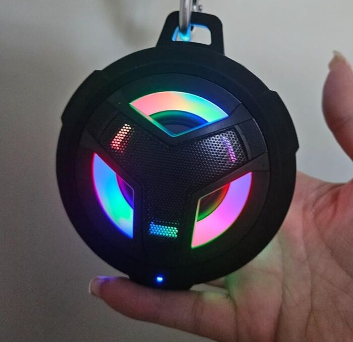 Portable Bluetooth speaker with colorful LED lights, ideal gifts for teens.