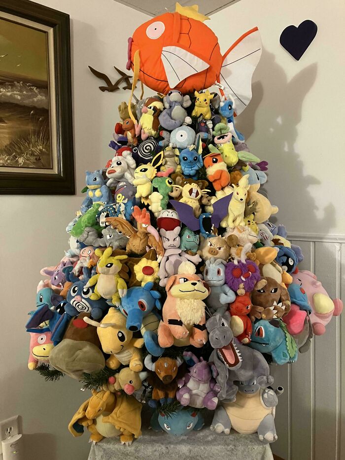 Unique Christmas tree idea using plush toys, featuring a top Magikarp decoration.