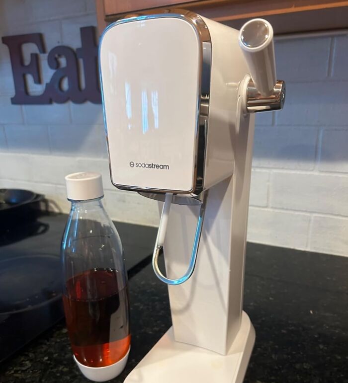  Sparkling Water Maker: It's A Sleek, Eco-Friendly Gift That'll Level Up Their Beverage Game And Look Fab On Their Kitchen Counter Too.