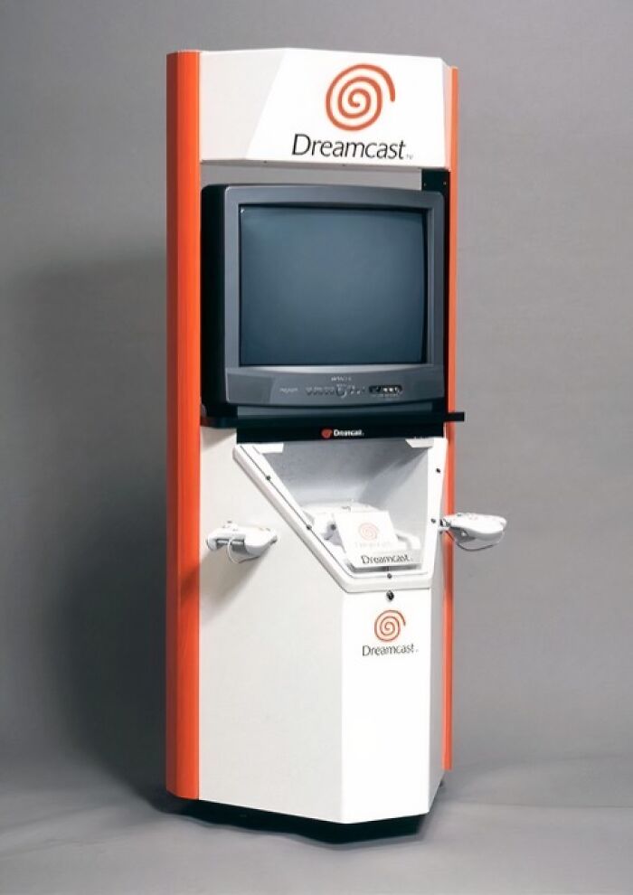 Dreamcast kiosk showcasing retro gaming setup, reflecting old internet feel pics.