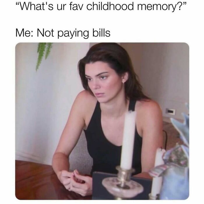 Woman at a table with a candle, captioned about favorite childhood memory and not paying bills; memes and relatable humor.