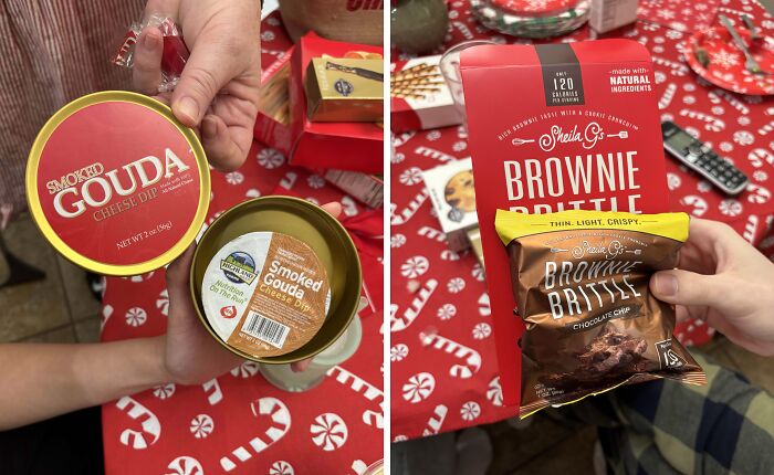 People holding disappointing presents: a can of smoked gouda cheese dip and a brownie brittle package on a festive table.