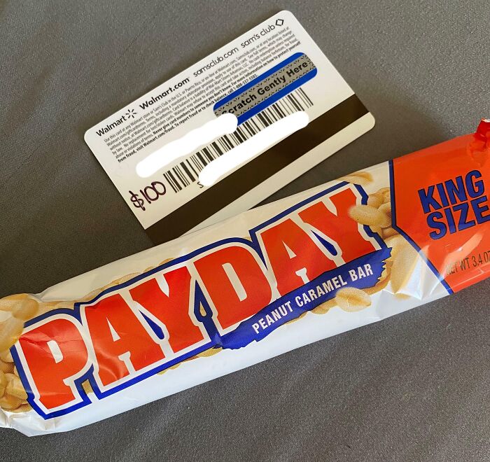 Payday candy bar and a $100 gift card, highlighting disappointing gifts.