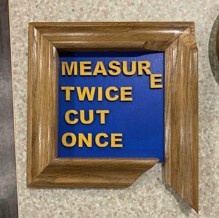 Hilarious trolling Christmas gift: wooden frame with humorous misaligned message "MEASURE TWICE CUT ONCE".