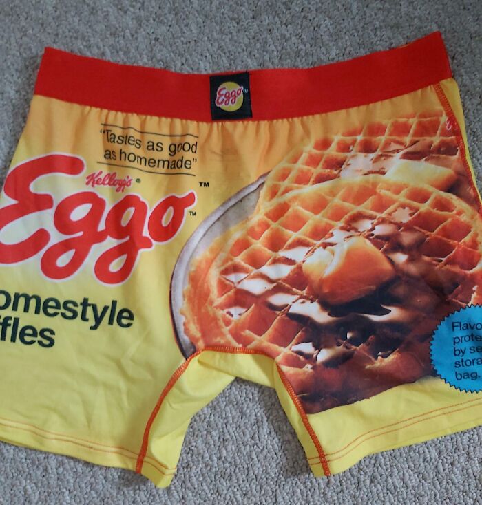 Funny waffle-themed underwear as a trolling Christmas gift on the carpet.