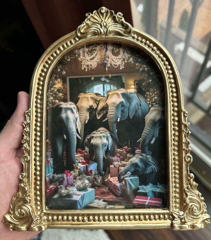 Elephants surrounded by Christmas gifts in a framed photo, exemplifying hilarious trolling gifts.