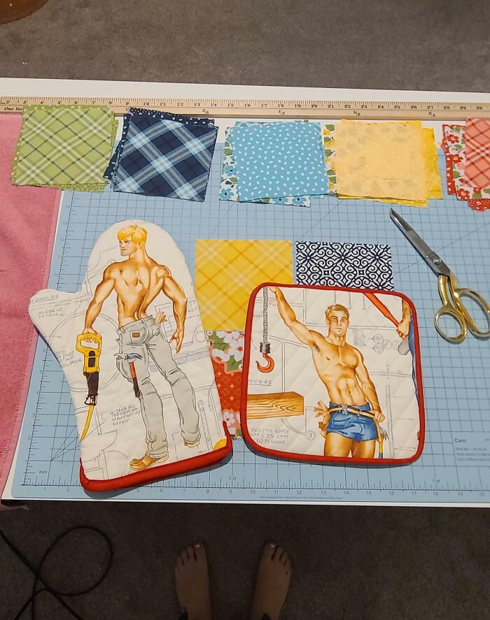 Hilarious trolling Christmas gifts with cheeky printed oven mitt and pot holder on a crafting table.