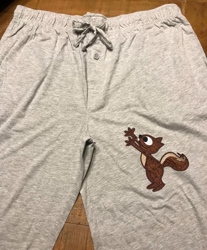 Gray pajama pants with a funny squirrel design, perfect for trolling Christmas gifts.