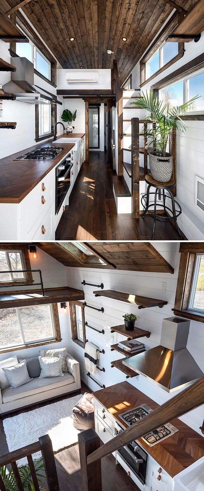 Tiny home interior with wooden finishes, featuring a compact kitchen and cozy loft space.