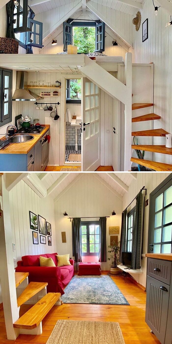 Cozy tiny home interior with wooden accents, featuring a compact kitchen, loft bed, and bright living area.
