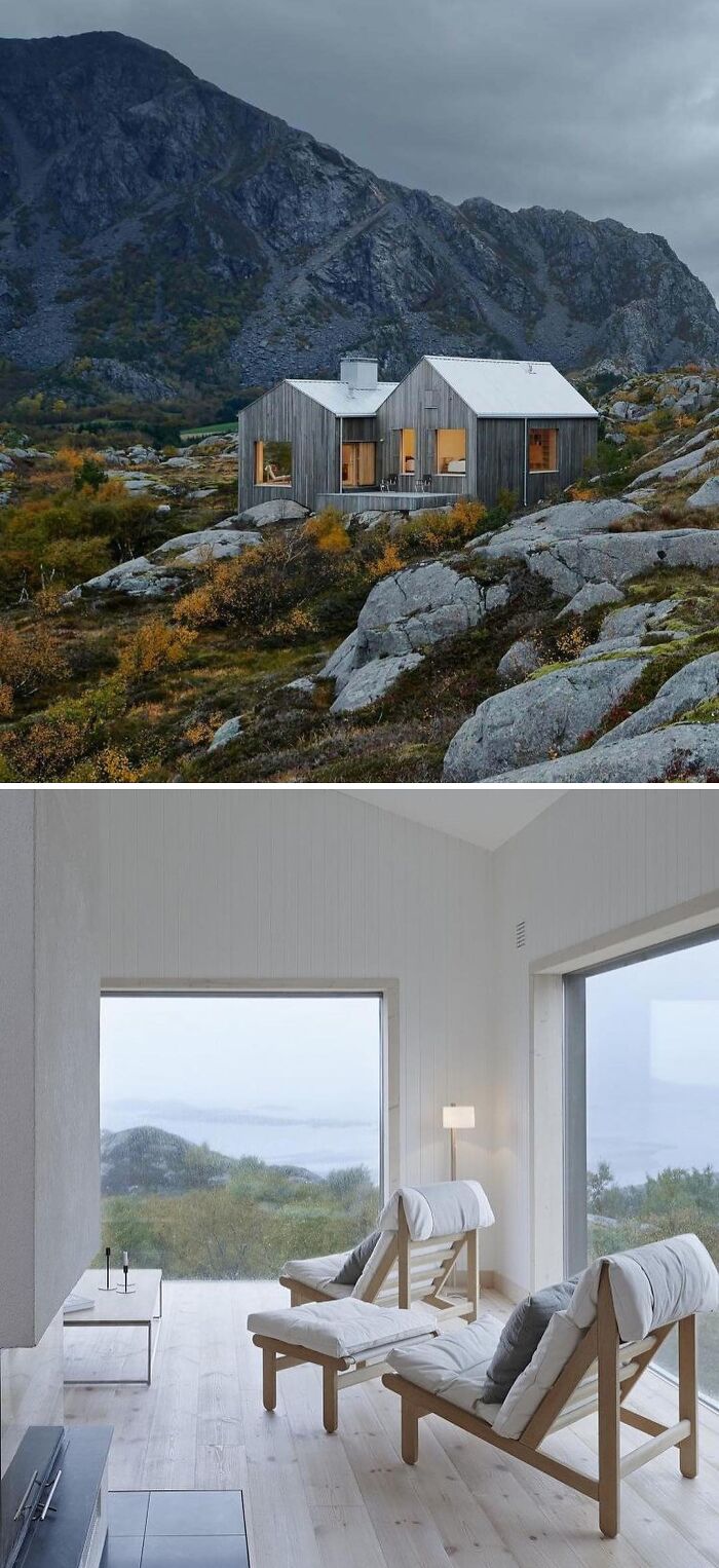 Tiny home nestled in a mountain landscape, with a cozy interior featuring two wooden chairs and large windows.