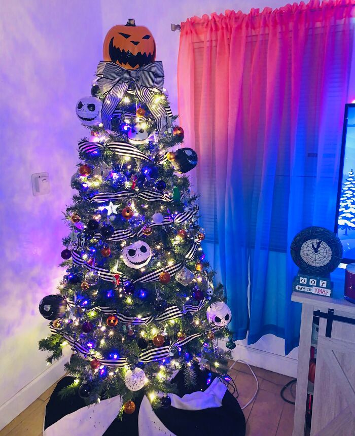 Festive Christmas tree idea with Jack Skellington decorations and colorful lights in a cozy living room setting.